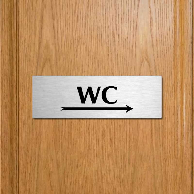 WC vpravo, 240x79mm, stříbrná popiska 